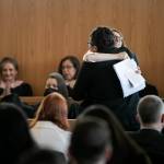 Laura Shaver hugs a member of the Lopez-Shaw family after giving a speech about her friend during the memorial for Judge Cassandra Lopez-Shaw Thursday at the Snohomish County Courthouse in Everett. (Ryan Berry / The Herald)