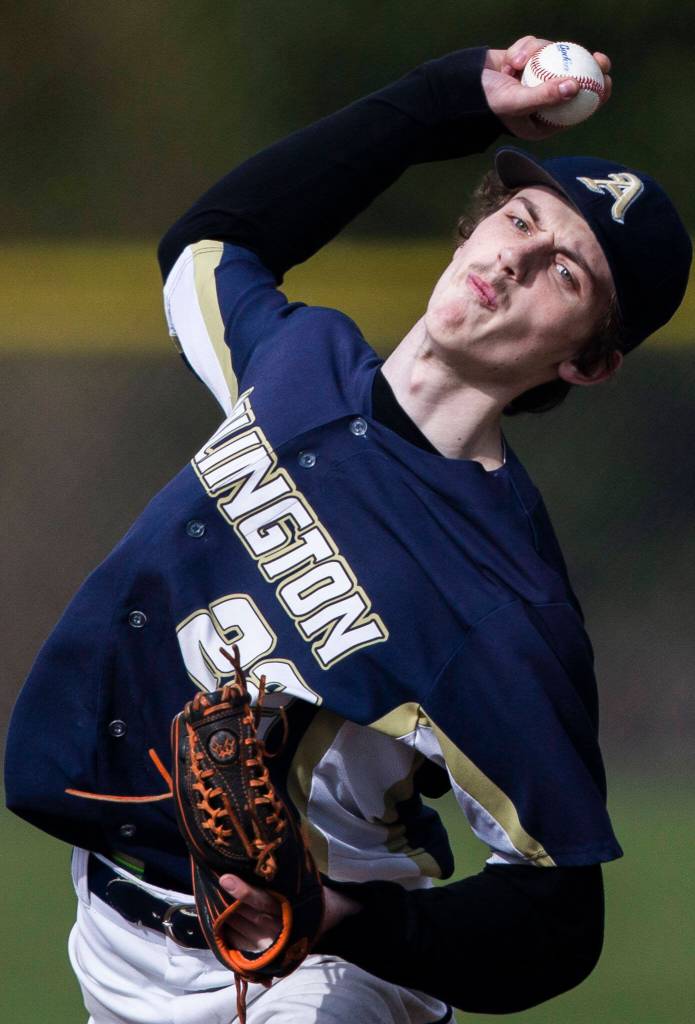 Arlingtons Jayce Jaubert pitches during the game against Monroe on Thursday, April 21, 2022 in Arlington, Washington. (Olivia Vanni / The Herald)