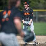 Monroes Seth Baldwin cheers after getting an out during the game against Arlington on Thursday, April 21, 2022 in Arlington, Washington. (Olivia Vanni / The Herald)