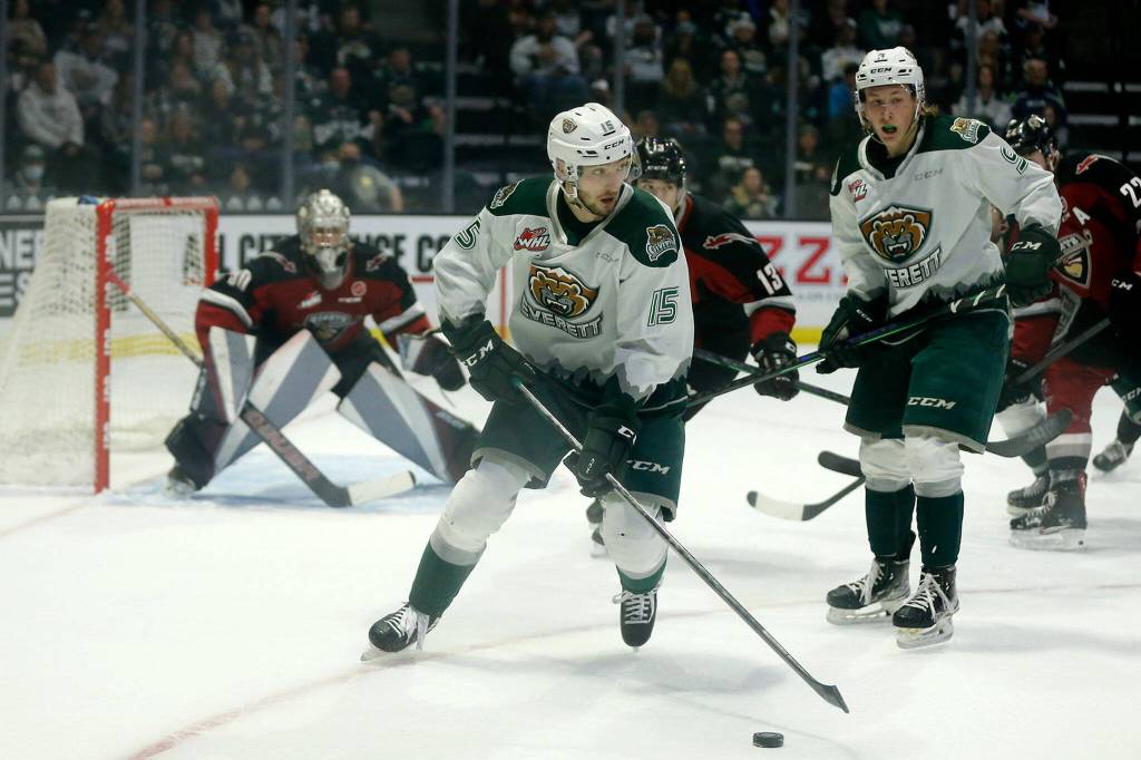 The Everett Silvertips&rsquo; Ryan Hofer collects the puck against the Vancouver Giants during the first round of the WHL playoffs Friday, April 22, 2022, at Angel of the Winds Arena in Everett, Washington. (Ryan Berry / The Herald)
