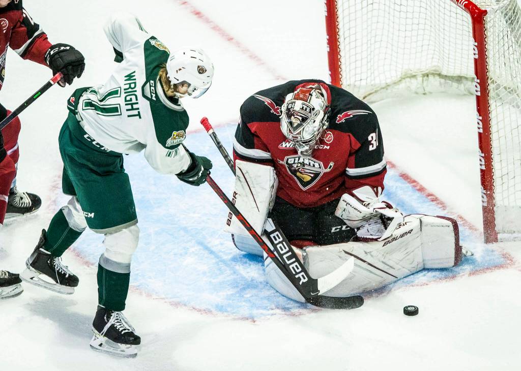 Silvertips Jacob Wright takes a shot on goal during the playoff match up against the Vancouver Giants on Saturday, April 23, 2022 in Everett, Washington. (Olivia Vanni / The Herald)