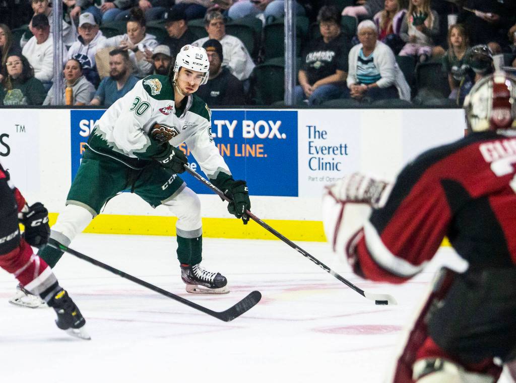 Silvertips Alex Swetlikoff lines up a shot on goal during the playoff match up against the Vancouver Giants on Saturday, April 23, 2022 in Everett, Washington. (Olivia Vanni / The Herald)