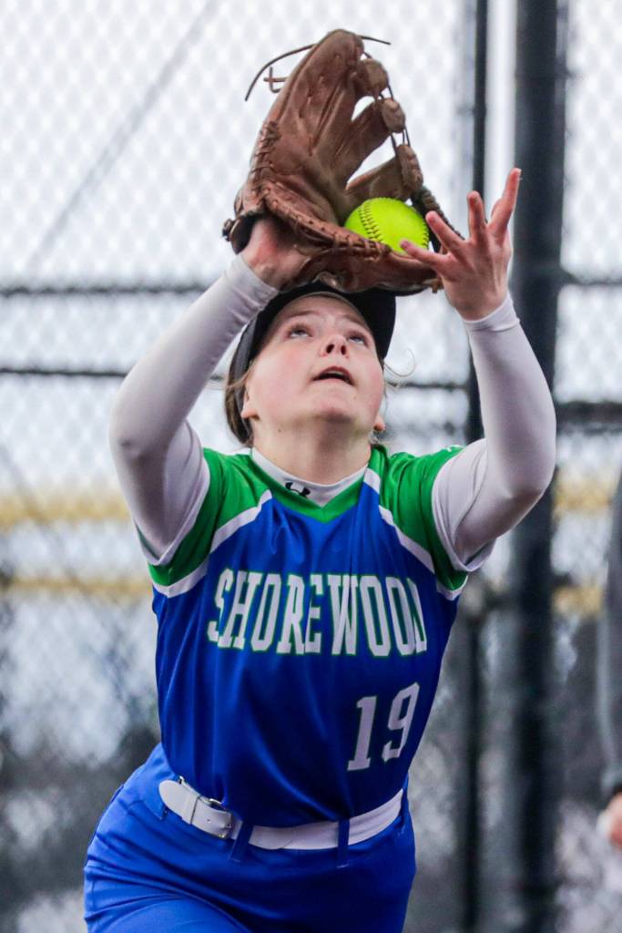 Shorewoods Paige Petschl catch a pop up against Cascade Monday afternoon at Phil Johnson Ballfields in Everett, Washington on April 25, 2022. The Bruins won 6-2. (Kevin Clark / The Herald)
