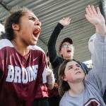 Cascade players cheer in the dugout. (Kevin Clark / The Herald)