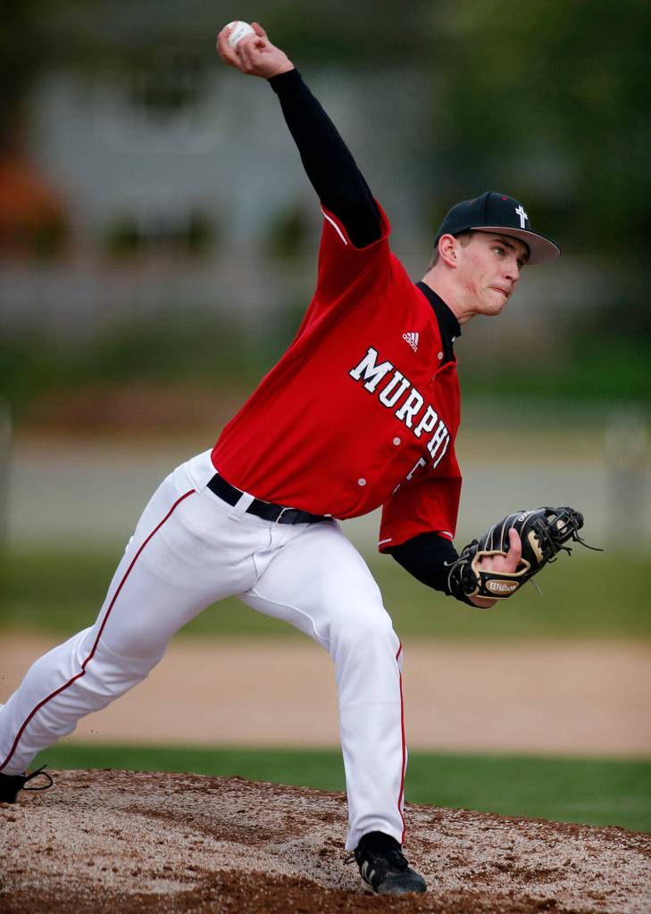 Archbishop Murphys Matt Overholt delivers a pitch against Stanwood Thursday, April 28, 2022, at Archbishop Murphy High School in Everett, Washington. (Ryan Berry / The Herald)