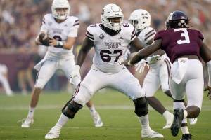 Mississippi State offensive lineman Charles Cross (67) sets his feet to block Texas A&M defensive lineman Tyree Johnson (3) during the first half of an NCAA college football game on Saturday, Oct. 2, 2021, in College Station, Texas. (AP Photo/Sam Craft)