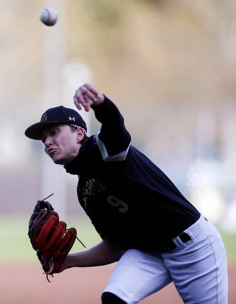 Lynnwoods Keenan Masters throws a pitch against Meadowdale Friday, April 29, 2022, at Meadowdale High School in Lynnwood, Washington. (Ryan Berry / The Herald)