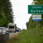 Vehicles travel in and out of Sultan along U.S. Route 2 on Thursday. (Ryan Berry / The Herald)