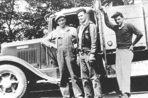 Fred Rubatino (left), an unidentified worker and Tom Rubatino in front of one of the company's garbage trucks in 1944.  (Rubatino Family)