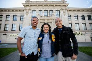 Sibilings Michael, Crystal and Garry Larson outside of Everett High School on Saturday, April 30, 2022 in Everett, Washington. (Olivia Vanni / The Herald)