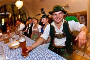 A Bavarian beer hall, you’ll find men in lederhosen.