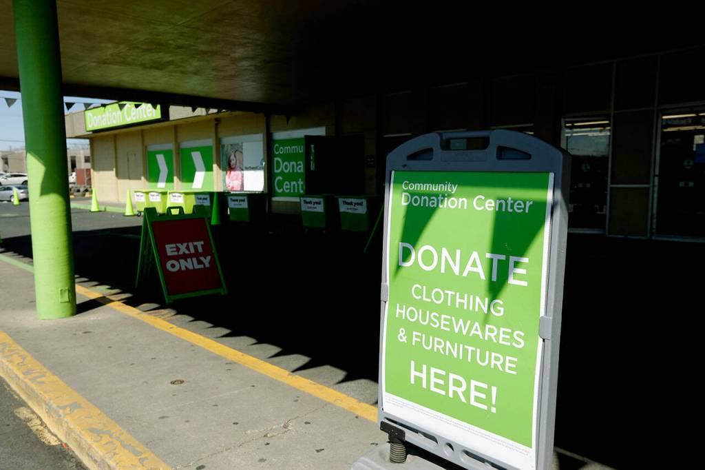 A donation drop-off sign at Value Village in Spokane. (Young Kwak / InvestigateWest)