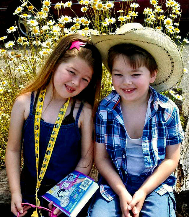 Maria Moore and her younger brother, T.J., before her cancer diagnosis in 2013. Maria was 9 when she died in 2015. T.J., 14, started collecting candy-themed items and donated the collection to raise money for Seattle Childrens cancer research. (Submitted photo)