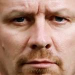 CROPPED FROM THIS:
Genna Martin/The Herald
Dayn Brunner and his son Riley, 17, pose for a photo at Darrington High School, Thursday, March 12, 2015.  Dayn's sister, Summer Raffo, was one of the 43 victims of the Oso mudslide.  Dayn and Riley spent five days searching the debris field before finding Summer in her car, hands still on the steering wheel.  Dayn spent a total of 39 days searching through the mud for other victims.  
Photo taken 03112015