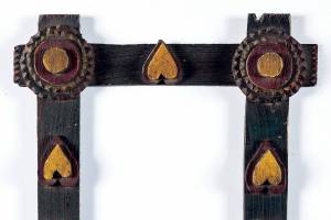 This tramp art picture frame was carved and painted by hand. It sold for $315 at a Pook & Pook auction.