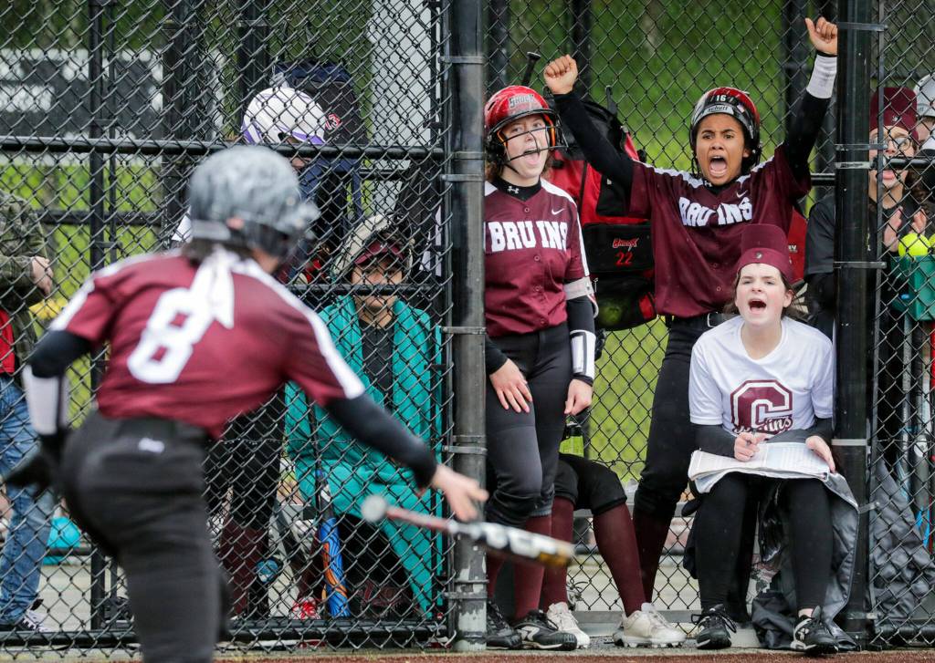 Cascades bench celebrates a walk for Cascades Sarah Anderson against Snohomish High School Thursday afternoon at Phil Johnson Ballfields in Everett, Washington on May 5, 2022. The Panthers won 9-3 in a key matchup between two of the top teams in Wesco 3A/2A. (Kevin Clark / The Herald)