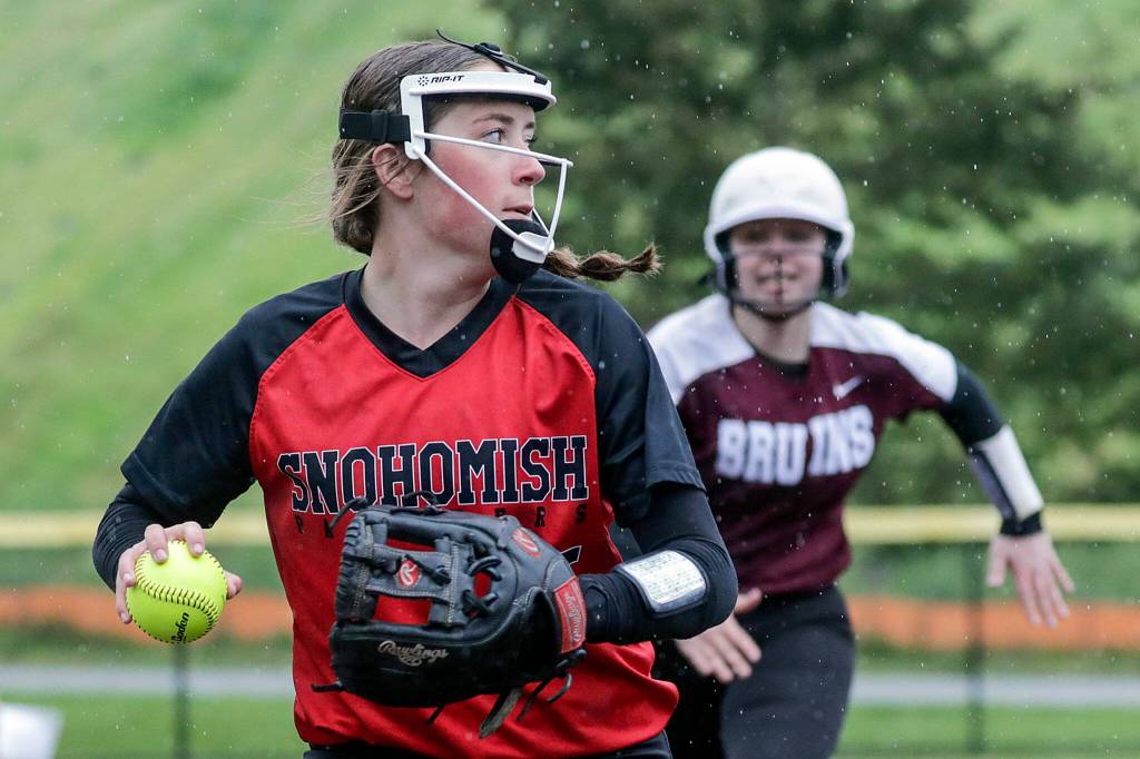 Snohomishs Camryn Sage tags out Cascades Katelyn Pryor, right, while looking for another play Thursday afternoon at Phil Johnson Ballfields in Everett, Washington on May 5, 2022. The Panthers won 9-3 in a key matchup between two of the top teams in Wesco 3A/2A. (Kevin Clark / The Herald)