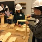 Freshman and sophomore girls from high schools in Snohomish County build wooden tool boxes as an introduction to the Regional Apprenticeship Pathways program at Marysville Pilchuck High School on Thursday, May 5, 2022. (Jon Bauer / The Herald)
