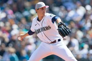 Seattle Mariners starting pitcher George Kirby works against the Tampa Bay Rays during the first inninga baseball game, Sunday, May 8, 2022, in Seattle. (AP Photo/John Froschauer)