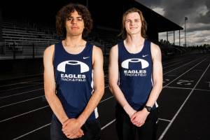 Arlington seniors and WSU signees Brandon Moore, left, and Aiden Emerson at Arlington High School on Monday, May 9, 2022 in Arlington, Washington. (Olivia Vanni / The Herald)