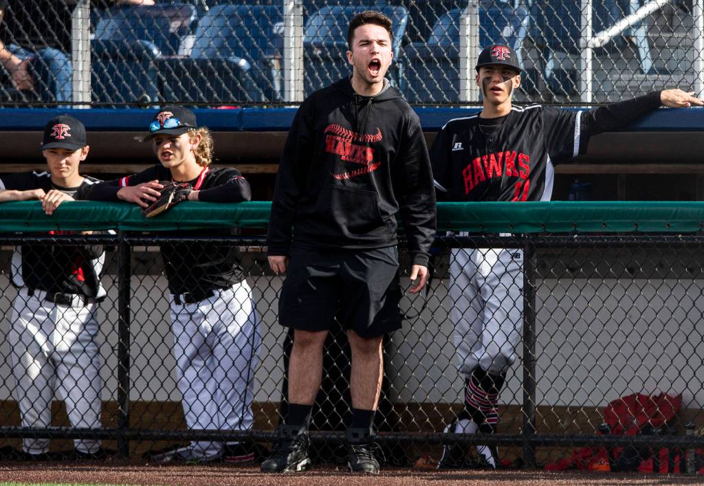 Mountlake Terrace players cheer on their teammate at bat during the district semifinal game at Funko Field on Tuesday in Everett. (Olivia Vanni / The Herald)