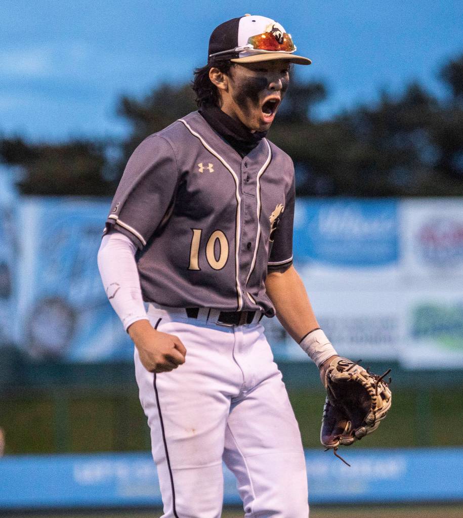 Lynnwoods Leyon Camantigue reacts to a strikeout during the district semifinal game at Funko Field on Tuesday in Everett. (Olivia Vanni / The Herald)