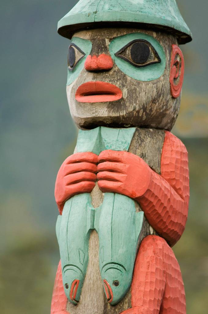 A totem pole in Haines, Alaska, speaks to tribal connections to salmon. (Amy Gulick)