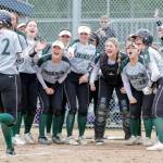 Jackson freshman Allie Thomsen is congratulated by her teammates after hitting a game-tying two-run homer in the Timberwolves 5-3 extra-inning win over Glacier Peak on Wednesday. (Kevin Clark / The Herald)