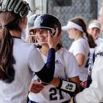Glacier Peaks Lauren Hufford welcomes Tyler Gordon after her scoring run. (Kevin Clark / The Herald)
