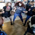 Members of PRISM, a club for LGBTQ youths and friends, close out a dance-off on a March 2022 afternoon at the Stanwood-Camano YMCA in Stanwood. (Kevin Clark / The Herald file photo)