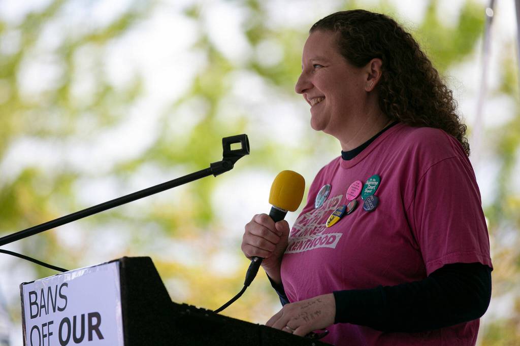 Megan Dunn, Snohomish County Council representative for District 2, speaks during Snohomish Countys Bans Off Our Bodies rally Saturday, May 14, 2022, outside the county courthouse in Everett, Washington. (Ryan Berry / The Herald)