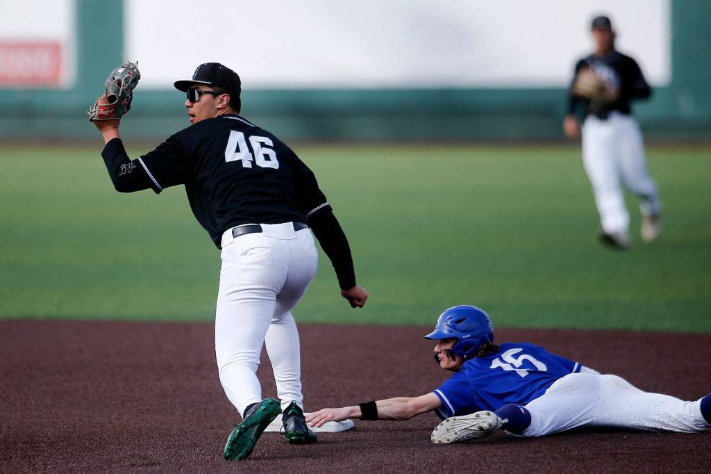 Jacksons Dominic Hellman turns to see the umpires call on a close play at second base against Bothell Friday, May 13, 2022, at Funko Field in Everett, Washington. (Ryan Berry / The Herald)