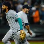 The Mariners Ty France (right) celebrates with J.P. Crawford after a game against the Mets on Friday in New York. The Mariners won 2-1. (AP Photo/Frank Franklin II)