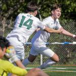 Mount Vernons Jonathan Mancillas-Garduno chases teammate Christopher Soto in celebration of a goal against Shorecrest Saturday afternoon at Shoreline Stadium in Shoreline, Washington on May 14, 2022. The Scots lost 2-1 in sudden death. (Kevin Clark / The Herald)