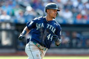 Seattle Mariners' Julio Rodriguez runs to first base after hitting an RBI-single during the seventh inning of a baseball game against the New York Mets, Sunday, May 15, 2022, in New York. (AP Photo/Noah K. Murray)