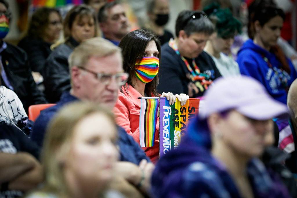 Students, parents and community leaders attend the school board meeting Monday evening at Cedarcrest Middle School in Marysville. (Kevin Clark / The Herald)