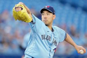 Toronto Blue Jays starting pitcher Yusei Kikuchi (16) throws during the first inning of a baseball game against the Seattle Mariners in Toronto, Monday, May 16, 2022. (Nathan Denette/The Canadian Press via AP)