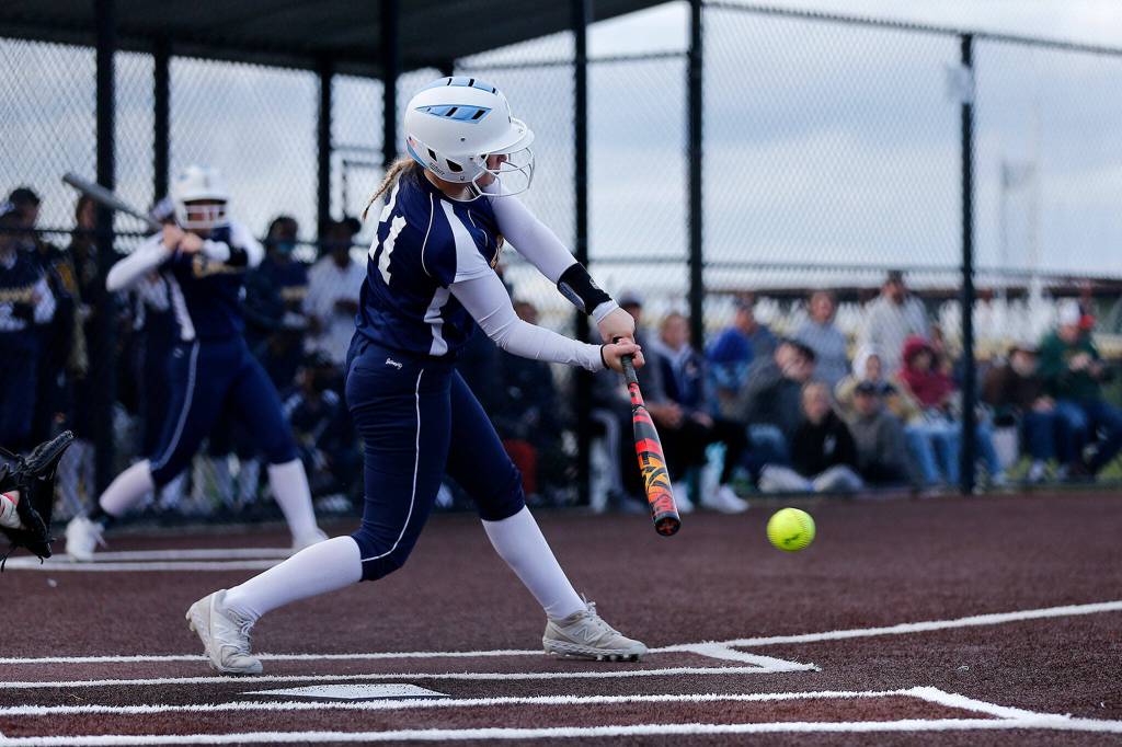 Everetts Maddie Pewitt gets on base with a hit through the infield against Snohomish during Tuesdays Class 3A District 1 matchup at the Phil Johnson Ballfields in Everett. (Ryan Berry / The Herald)