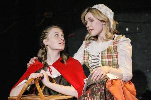 Cinderella_Red.jpg: Red Riding Hood (Katelynn Carlson) gets advice from Cinderella (Grace Helmcke) in Red Curtain’s production of Into the Woods, running May 20-June 5 at the Red Curtain Arts Center, 9315 State Ave. in Marysville.