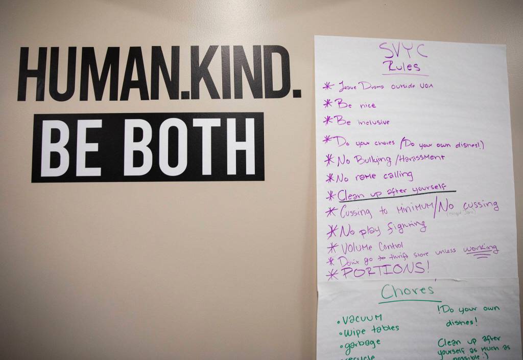 Sky Valley Youth Coalition rules hang on the wall at the new Volunteers for America storefront on May 16 in Sultan. (Olivia Vanni / The Herald)