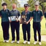 Kamiak's Luke Strand (left to right), Brandon Yoon, coach Vic Alinen, Daniel Kim, Brandon Suh and Aaron Choi pose for a photo after winning the Class 4A Distrcit 1 Tournament on May 17, 2022, at Legion Memorial Golf Course in Everett. (Contributed photo)