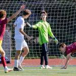 Reactions to Lakesides Cole Browns goal, far right, against Edmonds-Woodway during a Class 3A state tournament game Friday in Seattle. The Warriors lost 4-0. (Kevin Clark / The Herald) (Kevin Clark / The Herald)