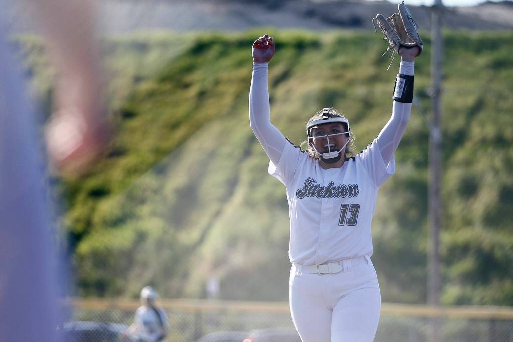 Jacksons Yanina Sherwood celebrates after getting the final out of the game against Lake Stevens during the 4A bi-district tournament Friday at the Phil Johnson Ballfields in Everett. (Ryan Berry / The Herald)