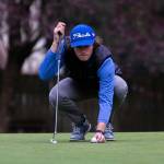 Shorewood’s Ben Borgida lines up his putt during the Tom Dolan Memorial Invitational at the Everett Golf & Country Club on Monday, April 11, 2022 in Everett, Washington. (Olivia Vanni / The Herald)