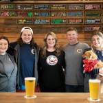 From left, Rachael Carrigan, Nate Hanson, Erin Hanson, Jeff Hanson and Kacie Hanson pose for a group photo at Thirsty Crab Brewery in Clinton. (Ryan Berry / The Herald)