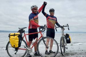 Gene Woodard, 68, and Ray Wittmier, 67, are riding coast-to-coast on a 50-day trek.