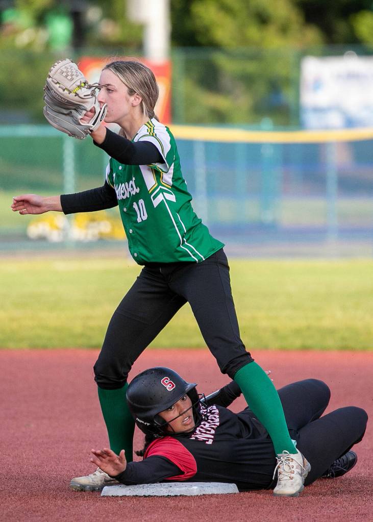 Roosevelts Katherine Thorson tags out Snohomishs Emma Hansen in the 3A State quarter-finals Friday evening in Lacey, Washington on May 27, 2022. The Panthers lost 14-13 in 8 innings. (Kevin Clark / The Herald)