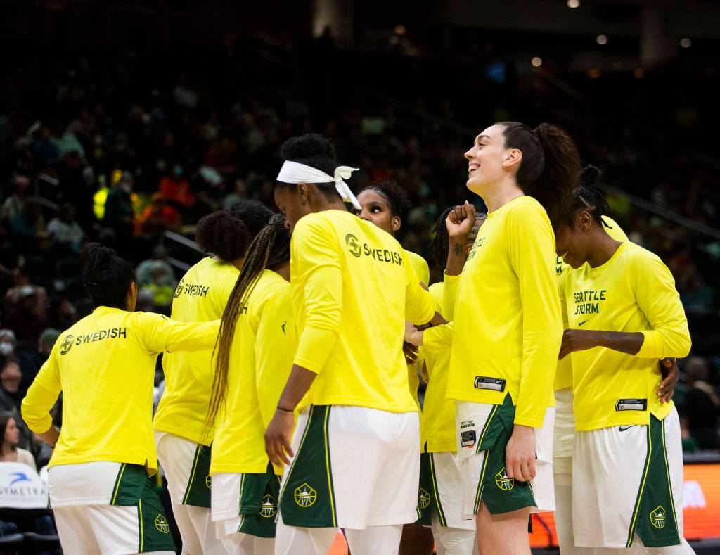 Seattle Storms Breanna Stewart laughs with her teammates before the start of the 3rd quarter during the game against the Liberty on Sunday, May 29, 2022 in Seattle, Washington. (Olivia Vanni / The Herald)