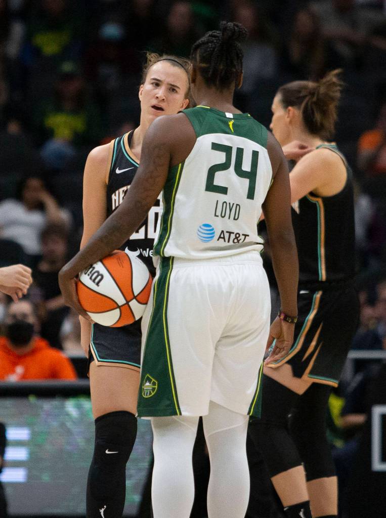 Seattle Storms Jewell Loyd and New York Libertys Sabrina Ionescu exchange words after a foul call on Ionescu during the game on Sunday, May 29, 2022 in Seattle, Washington. (Olivia Vanni / The Herald)
