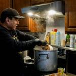 Terry Fast Horse, pictured here cooking chili for Indian tacos, is a Tulalip resident of Lummi and Lakota descent and a descendant of boarding school survivors. (Taylor Goebel / The Herald)